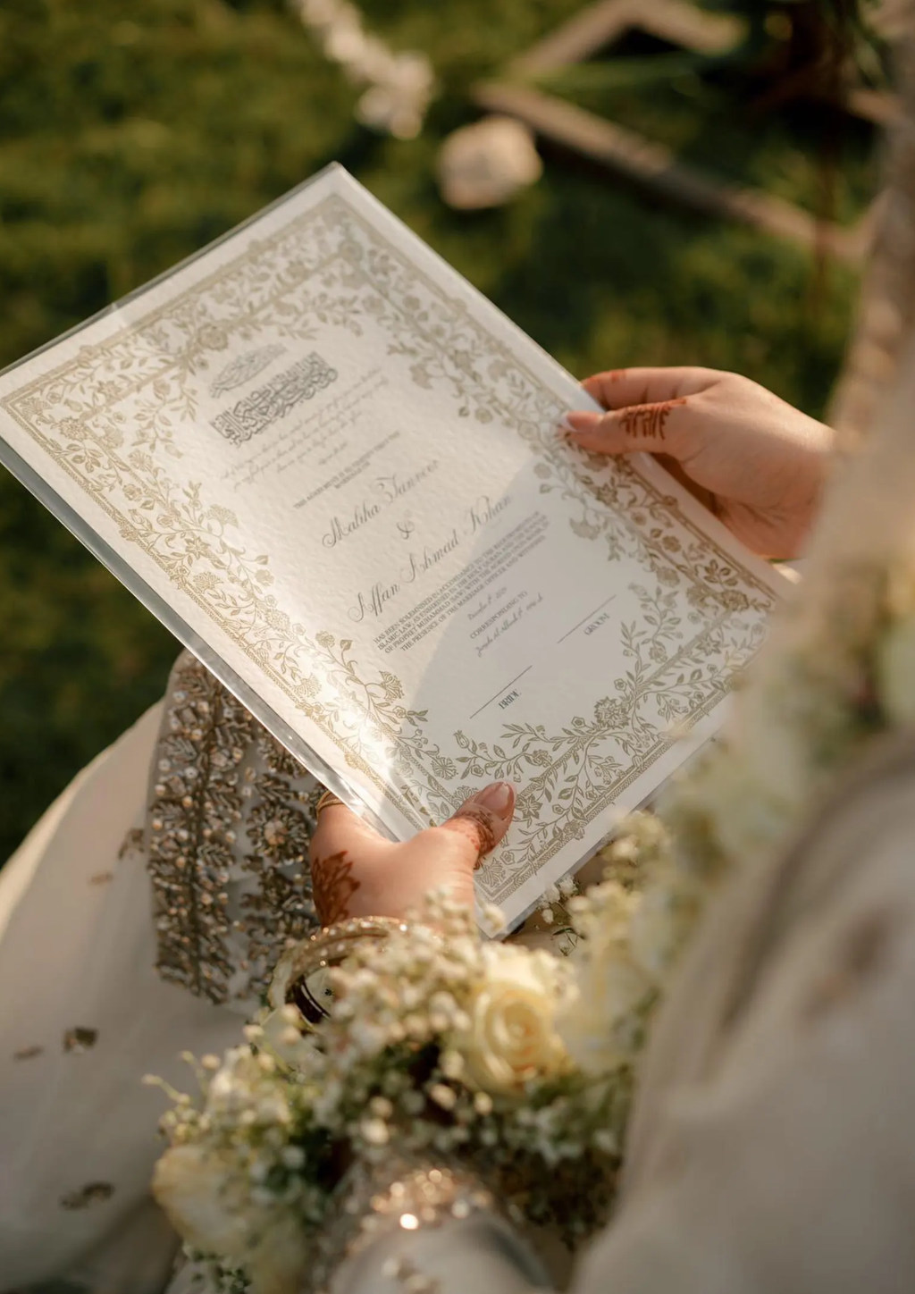 Certificat de mariage Meriam de Création Oriental, document officiel avec texte calligraphié et motifs décoratifs arabes.